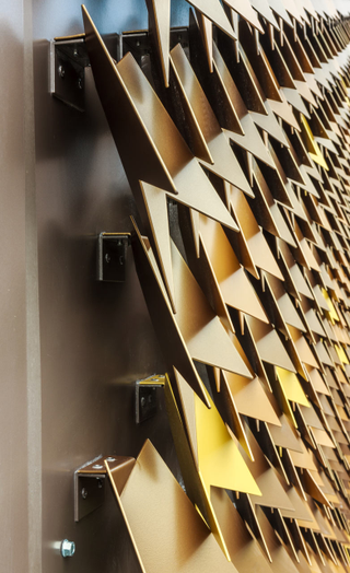 Illustration for article titled Aluminum Leaves Give This London House a Groovy Geometric Facade